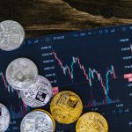 close up shot of silver and gold round coins