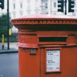 oblong brown metal mailbox